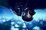 photography of pilot upside down in cockpit of Tornado aircraft