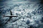 Photography of Airbus A340 flying above clouds