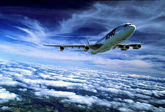 Airbus above clouds