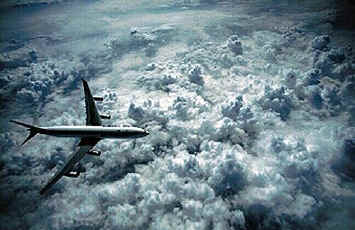 Civil aircraft above clouds