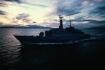 Photography of Royal Navy ship at dawn