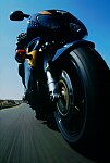 Photography of motor bike close on track