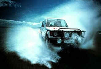 4 x 4 driving through sea