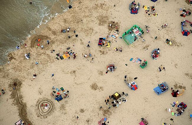 Holidaymakers on the beach at Newquay