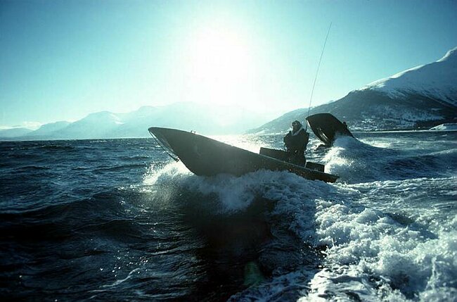 45 commando rigid raiders in the fjord.