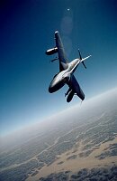 Hawker Siddeley Hunter in Oman high over the desert.