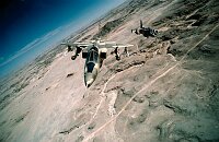 Jaguar aircraft flying across the desert