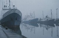 Trawlers and fishing boats in Grimsby docks early in the morning